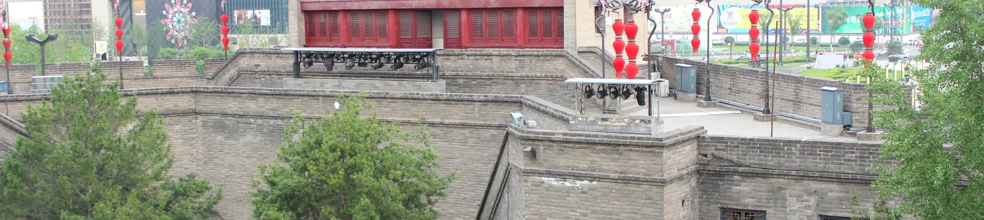 Xi'an stone city wall decorated with colorful hanging festival ornaments