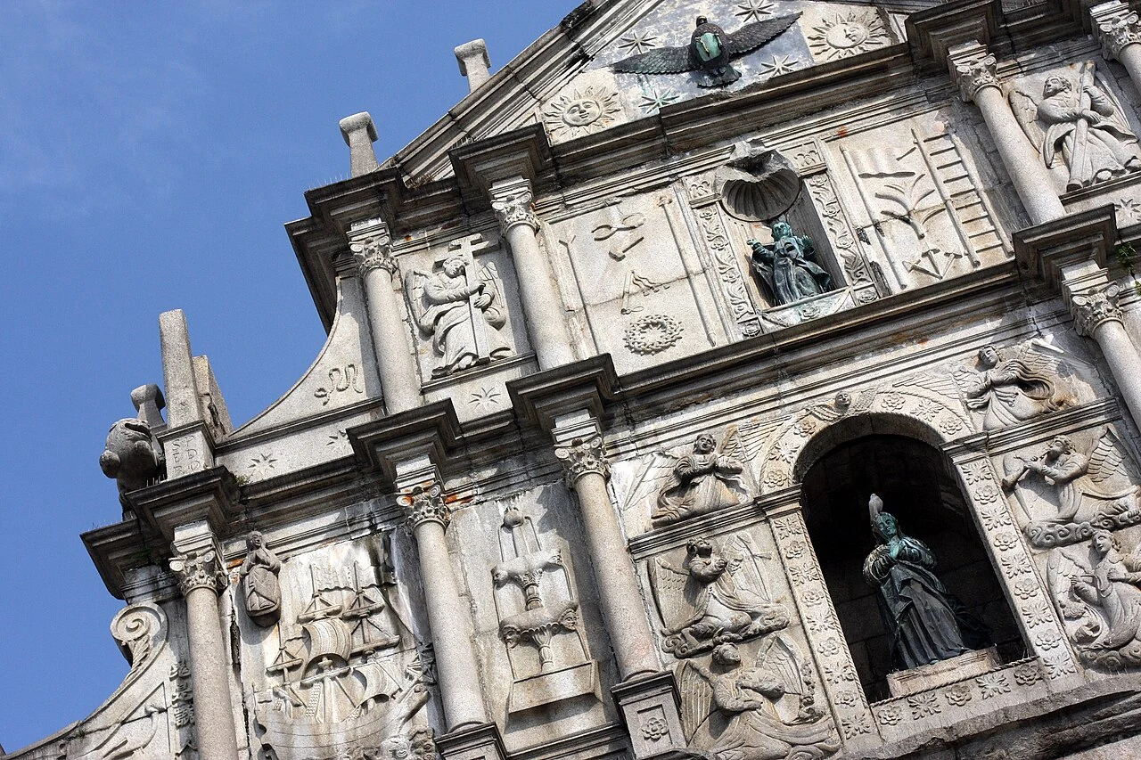 Carved stone facade and arched window of the Ruins of St. Paul's in Macau