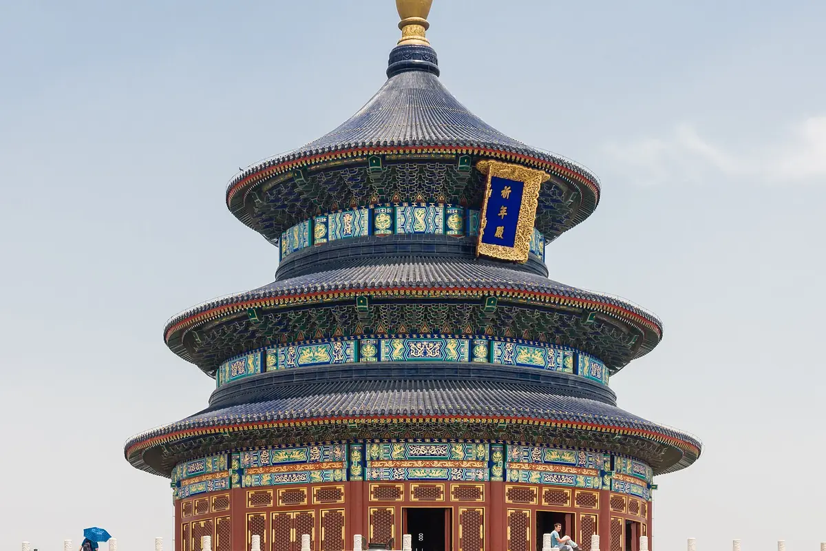 Temple of Heaven's circular blue-tiled roofs and colorful painted beams in Beijing