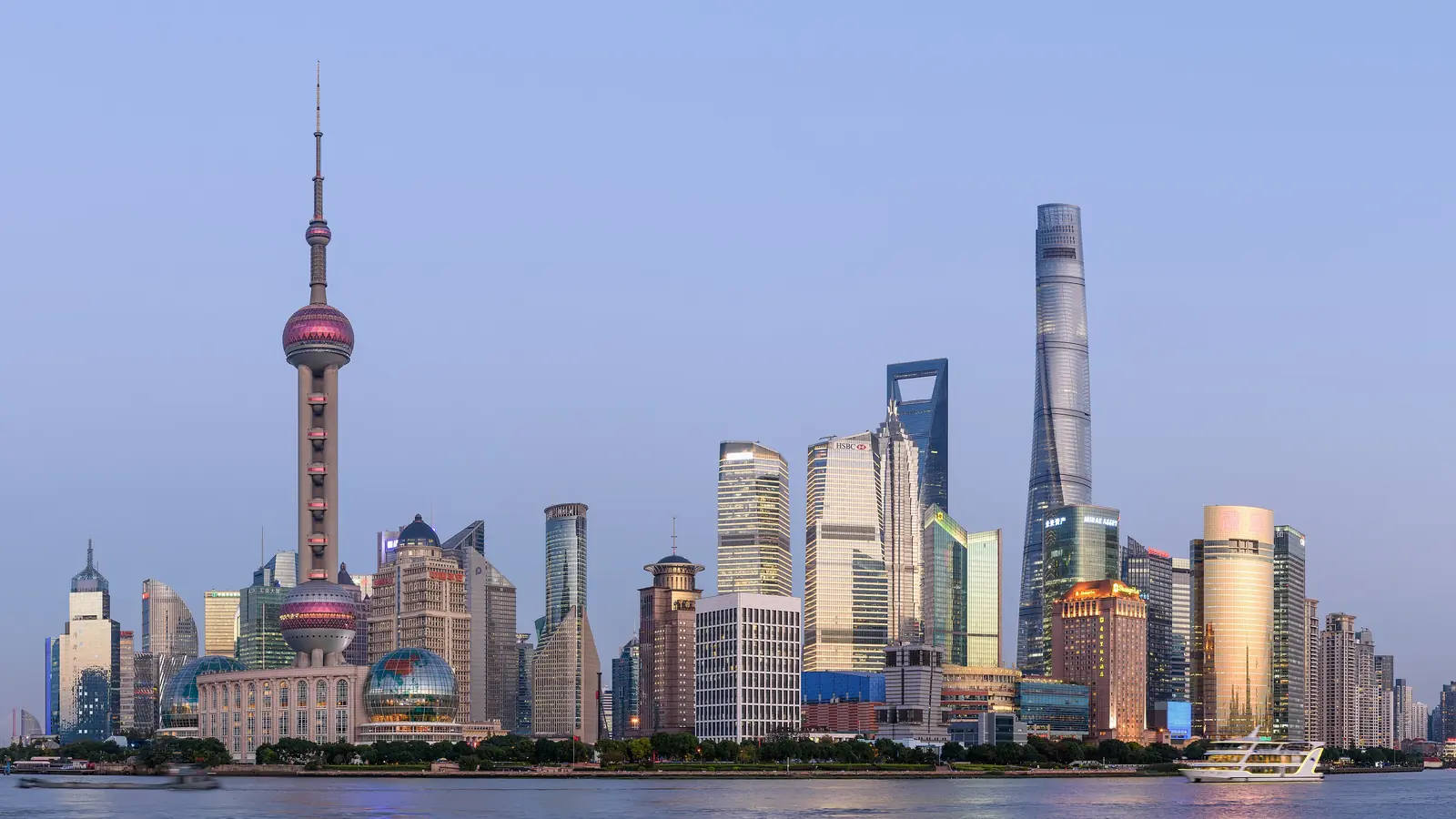 Shanghai's Pudong skyline with the Oriental Pearl Tower beside the Huangpu River
