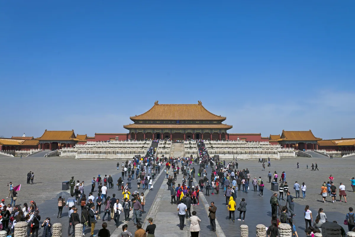 Visitors in a Forbidden City courtyard in Beijing