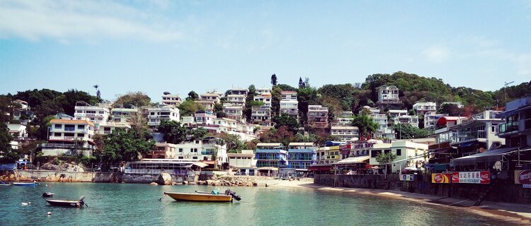 Fishing boats and clustered waterfront houses on Lamma Island, Hong Kong
