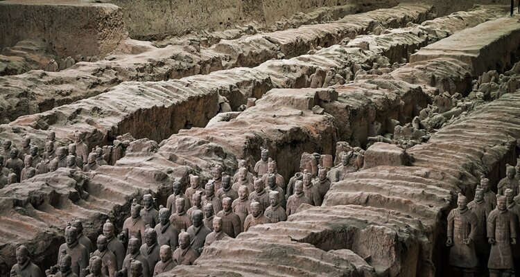 Rows of Terracotta Warriors in excavated trenches at the Terracotta Army Museum near Xi'an